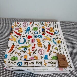 Scarf or neckerchief with good luck symbols and phrases in Portuguese.